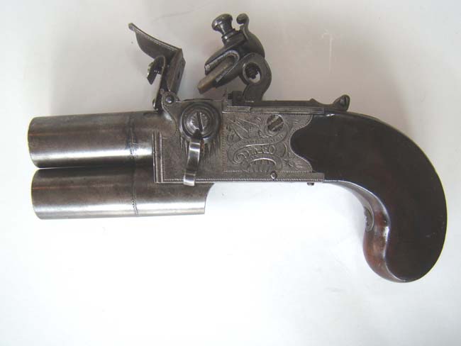 An 18th century double barreled flintlock pocket pistol signed "H.W. Mortimer, Gun Maker to His Majesty" circa 1790. — image 2